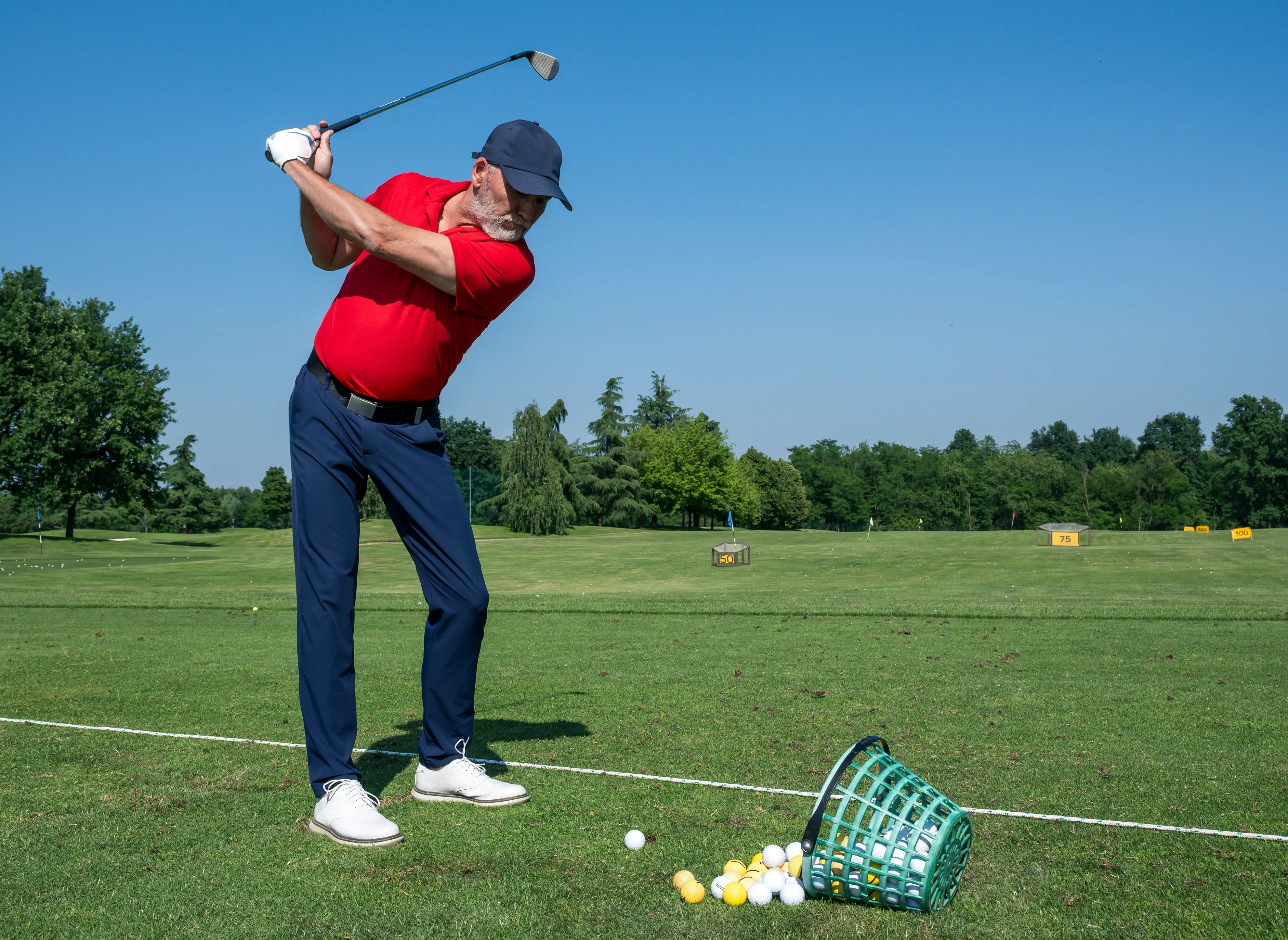 Golfer practicing on driving range